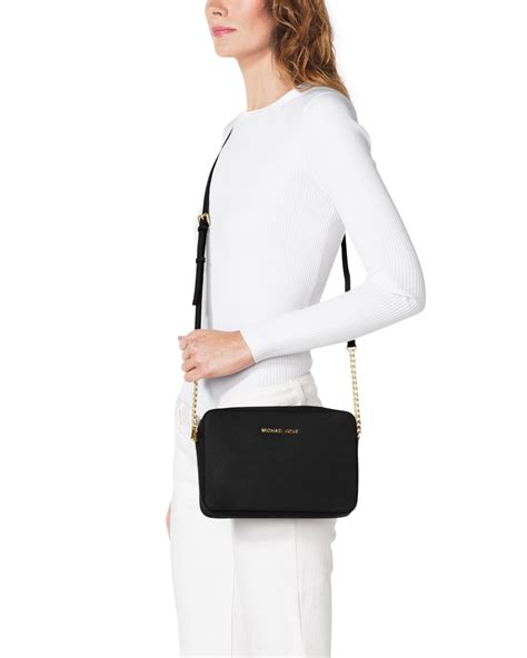 michael kors jet crossbody|Michael Kors Crossbody jet set.